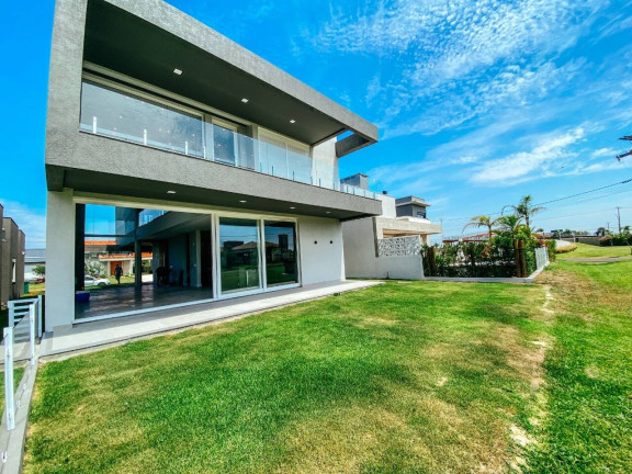 Imagem Casa com 4 Quartos à Venda, 307 m² em Xangri-lá Imagem Casa com 4 Quartos à Venda, 307 m² em Xangri-lá