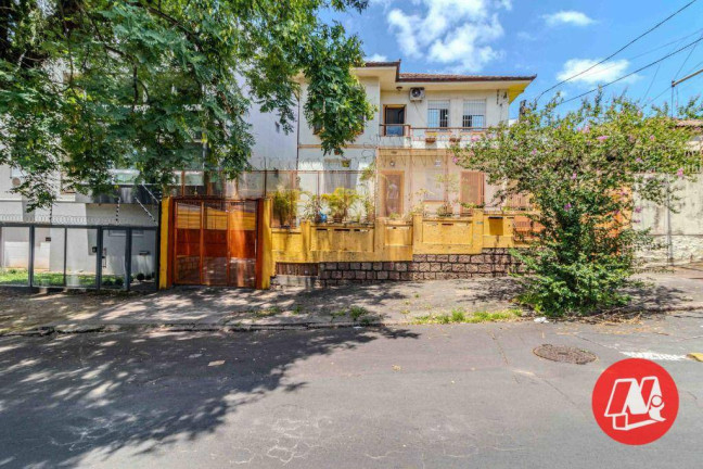 Imagem Casa com 5 Quartos à Venda, 142 m² em Menino Deus - Porto Alegre Imagem Casa com 5 Quartos à Venda, 142 m² em Menino Deus - Porto Alegre