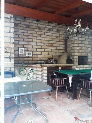 Imagem Casa com 4 Quartos à Venda, 317 m² em Centenário - Torres