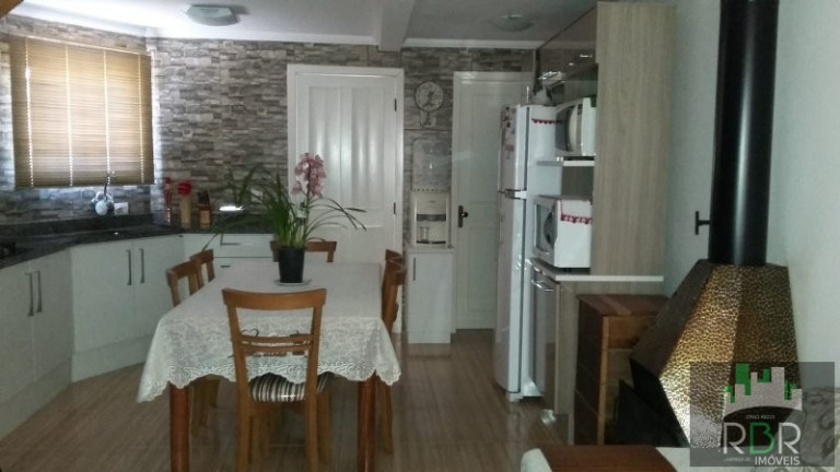 Imagem Casa com 2 Quartos à Venda, 81 m² em Caxias Do Sul Imagem Casa com 2 Quartos à Venda, 81 m² em Caxias Do Sul