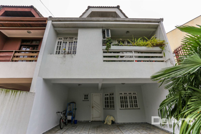 Imagem Sobrado com 4 Quartos à Venda, 221 m² em Jardim Das Américas - Curitiba Imagem Sobrado com 4 Quartos à Venda, 221 m² em Jardim Das Américas - Curitiba