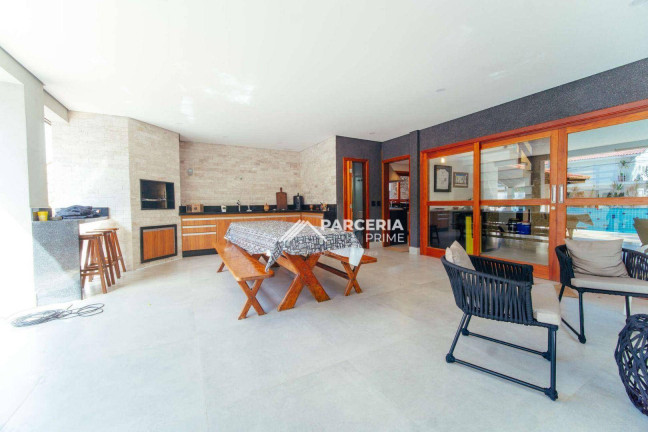 Imagem Casa com 6 Quartos à Venda, 334 m² em Riviera Módulo 19 - Bertioga Imagem Casa com 6 Quartos à Venda, 334 m² em Riviera Módulo 19 - Bertioga