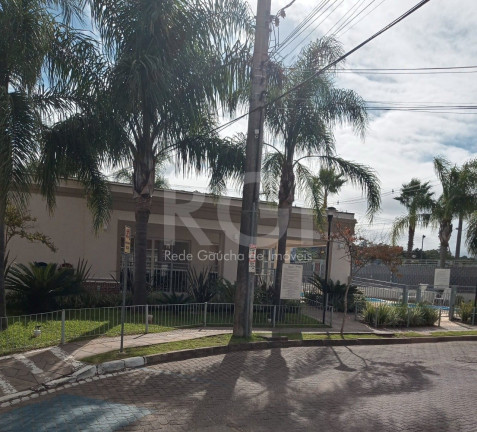 Imagem Casa de Condomínio com 2 Quartos à Venda, 56 m² em Restinga - Porto Alegre Imagem Casa de Condomínio com 2 Quartos à Venda, 56 m² em Restinga - Porto Alegre