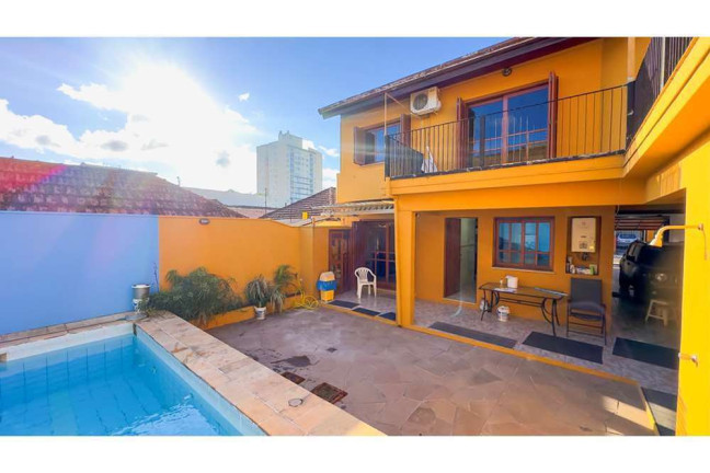 Imagem Casa com 4 Quartos à Venda, 307 m² em Partenon - Porto Alegre Imagem Casa com 4 Quartos à Venda, 307 m² em Partenon - Porto Alegre