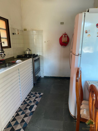 Imagem Casa de Condomínio com 3 Quartos à Venda, 128 m² em Massaguaçu - Caraguatatuba