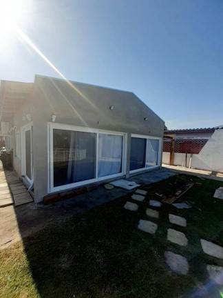 Imagem Casa com 4 Quartos à Venda, 120 m² em Xangri-lá Imagem Casa com 4 Quartos à Venda, 120 m² em Xangri-lá