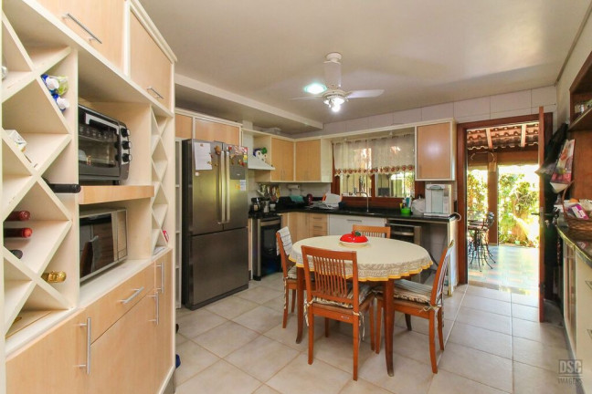 Imagem Casa de Condomínio com 3 Quartos à Venda, 389 m² em Vila Nova - Porto Alegre Imagem Casa de Condomínio com 3 Quartos à Venda, 389 m² em Vila Nova - Porto Alegre