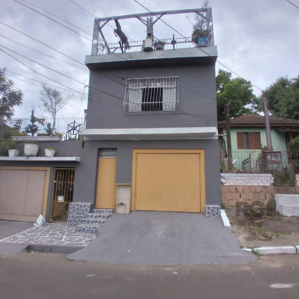Casa com 8 Quartos à Venda, 300 m² em Cavalhada - Porto Alegre