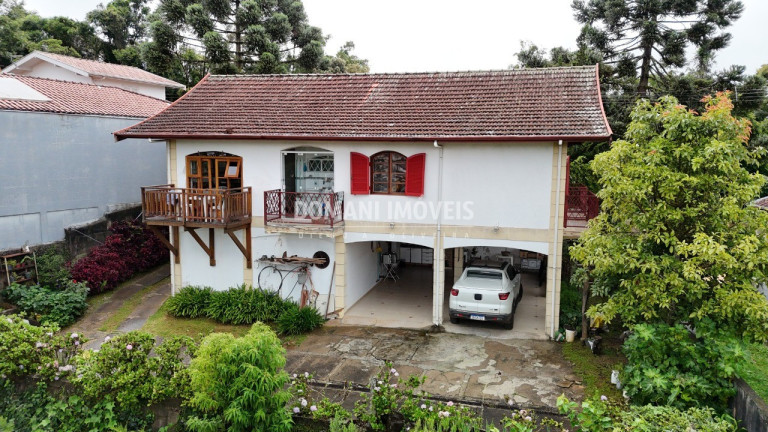 Imagem Casa com 4 Quartos à Venda, 248 m² em Região Da Abernéssia - Campos Do Jordão