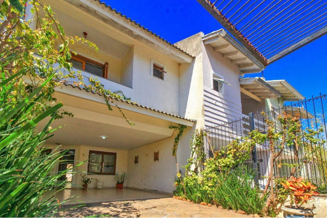 Imagem Casa com 4 Quartos à Venda, 201 m² em Espírito Santo - Porto Alegre Imagem Casa com 4 Quartos à Venda, 201 m² em Espírito Santo - Porto Alegre