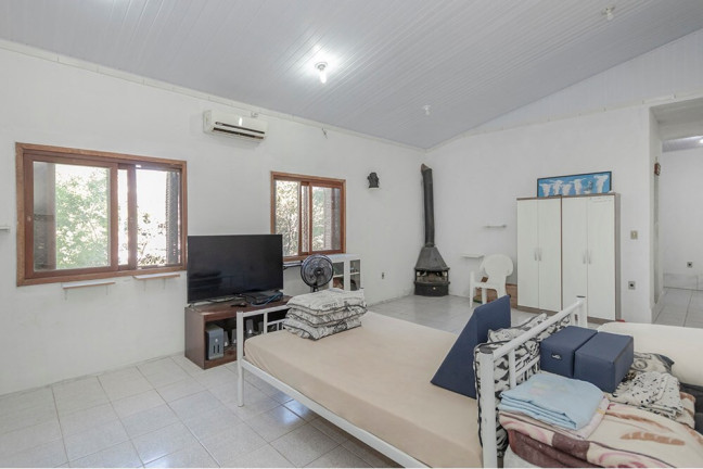 Imagem Casa com 3 Quartos à Venda, 250 m² em Espírito Santo - Porto Alegre Imagem Casa com 3 Quartos à Venda, 250 m² em Espírito Santo - Porto Alegre