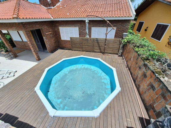 Imagem Casa com 3 Quartos à Venda, 126 m² em Centenário - Torres Imagem Casa com 3 Quartos à Venda, 126 m² em Centenário - Torres