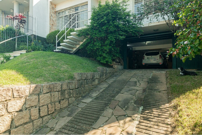 Imagem Casa com 3 Quartos à Venda, 248 m² em Três Figueiras - Porto Alegre Imagem Casa com 3 Quartos à Venda, 248 m² em Três Figueiras - Porto Alegre