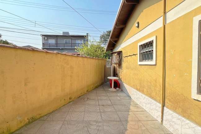 Imagem Casa com 2 Quartos à Venda, 101 m² em Vila Nova - Porto Alegre Imagem Casa com 2 Quartos à Venda, 101 m² em Vila Nova - Porto Alegre