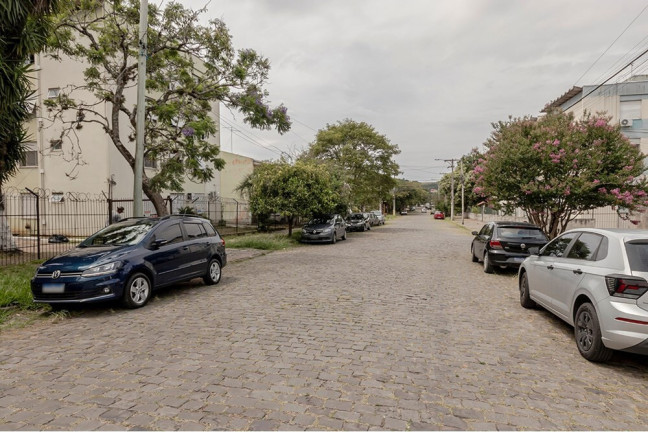 Imagem Casa com 4 Quartos à Venda, 170 m² em Vila Nova - Porto Alegre Imagem Casa com 4 Quartos à Venda, 170 m² em Vila Nova - Porto Alegre