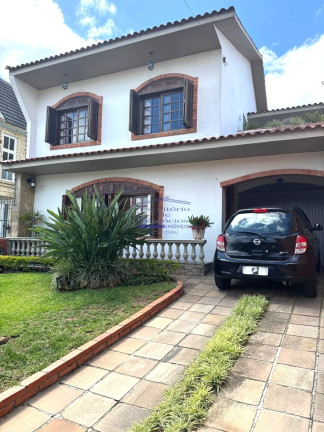 Imagem Casa com 3 Quartos à Venda, 244 m² em Cavalhada - Porto Alegre Imagem Casa com 3 Quartos à Venda, 244 m² em Cavalhada - Porto Alegre