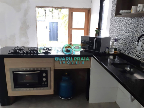 Imagem Casa com 4 Quartos à Venda, 180 m² em Jardim Virgínia - Guarujá