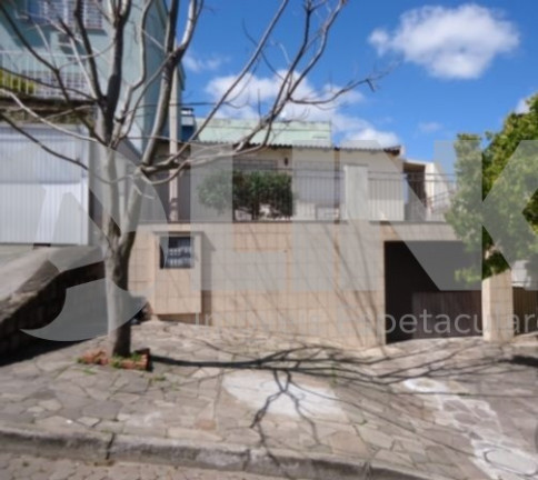 Imagem Casa com 4 Quartos à Venda, 179 m² em Medianeira - Porto Alegre