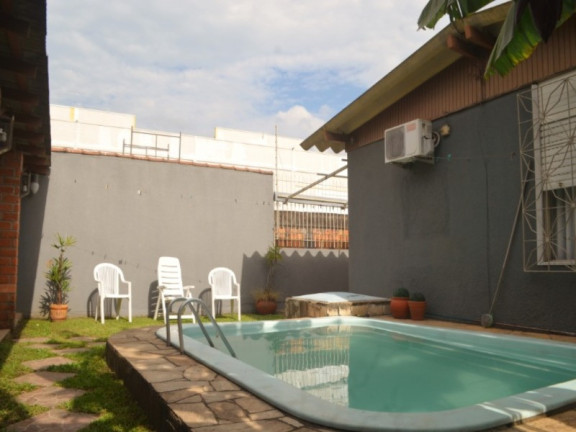 Imagem Casa com 3 Quartos à Venda, 90 m² em Parque Santa Fé - Porto Alegre Imagem Casa com 3 Quartos à Venda, 90 m² em Parque Santa Fé - Porto Alegre
