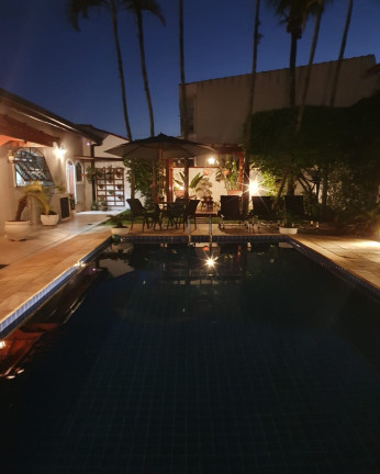 Imagem Casa com 4 Quartos à Venda, 360 m² em Vila Santa Rosa - Guarujá