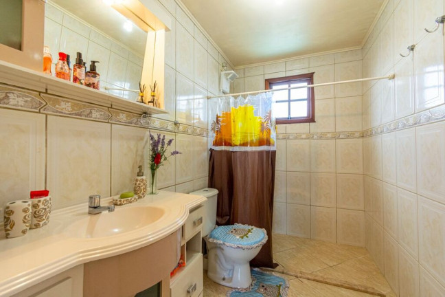 Imagem Casa com 4 Quartos à Venda, 165 m² em Igara - Canoas Imagem Casa com 4 Quartos à Venda, 165 m² em Igara - Canoas