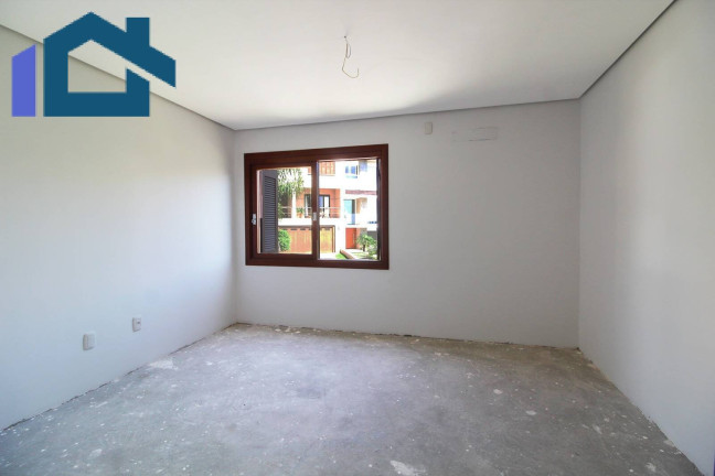 Imagem Sobrado com 3 Quartos à Venda, 224 m² em Vila Nova - Porto Alegre