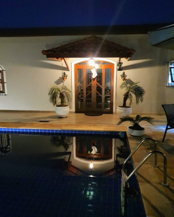 Imagem Casa com 4 Quartos à Venda, 360 m² em Vila Santa Rosa - Guarujá