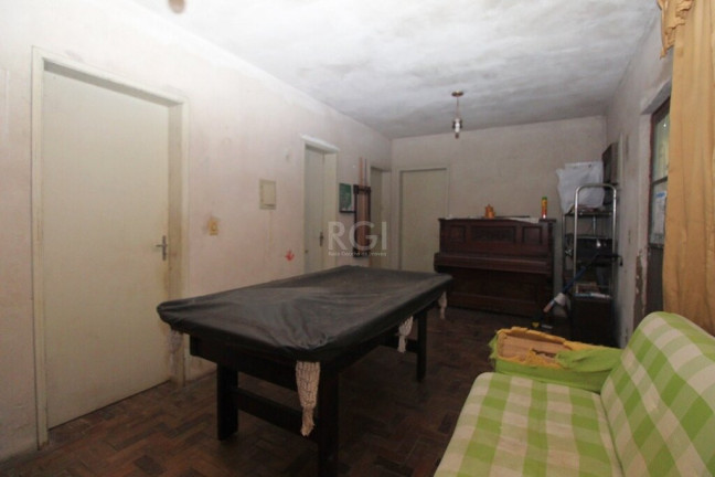 Imagem Casa com 4 Quartos à Venda, 300 m² em Glória - Porto Alegre Imagem Casa com 4 Quartos à Venda, 300 m² em Glória - Porto Alegre