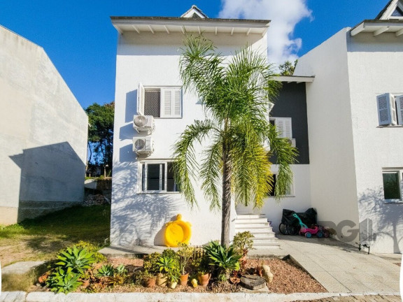 Imagem Casa com 4 Quartos à Venda,  em Vila Nova - Porto Alegre