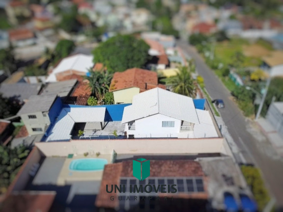 Imagem Casa com 4 Quartos à Venda,  em Setiba - Guarapari