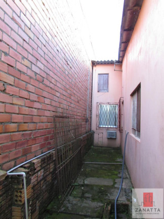 Imagem Casa com 3 Quartos à Venda, 30 m² em Tamandaré - Esteio Imagem Casa com 3 Quartos à Venda, 30 m² em Tamandaré - Esteio