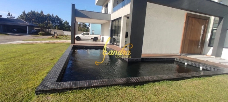 Imagem Casa de Condomínio com 4 Quartos à Venda, 419 m² em Atlantida Sul - Osorio Imagem Casa de Condomínio com 4 Quartos à Venda, 419 m² em Atlantida Sul - Osorio