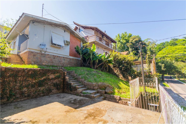 Imagem Casa com 3 Quartos à Venda, em Santa Tereza - Porto Alegre Imagem Casa com 3 Quartos à Venda, em Santa Tereza - Porto Alegre