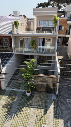 Imagem Sobrado com 3 Quartos à Venda, 205 m² em Jardim Das Américas - Curitiba Imagem Sobrado com 3 Quartos à Venda, 205 m² em Jardim Das Américas - Curitiba
