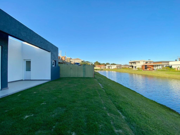 Imagem Casa com 4 Quartos à Venda, 183 m² em Capão Da Canoa - Capao Da Canoa