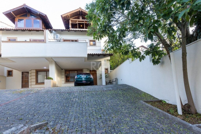 Imagem Casa de Condomínio com 3 Quartos à Venda, 217 m² em Tristeza - Porto Alegre Imagem Casa de Condomínio com 3 Quartos à Venda, 217 m² em Tristeza - Porto Alegre