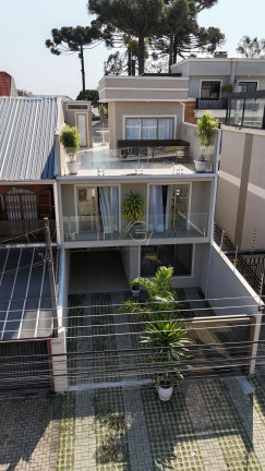 Imagem Sobrado com 3 Quartos à Venda, 205 m² em Jardim Das Américas - Curitiba Imagem Sobrado com 3 Quartos à Venda, 205 m² em Jardim Das Américas - Curitiba