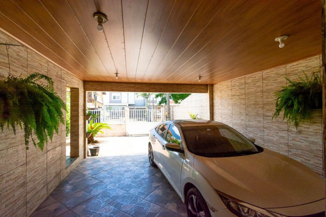 Imagem Casa com 4 Quartos à Venda, 165 m² em Igara - Canoas Imagem Casa com 4 Quartos à Venda, 165 m² em Igara - Canoas