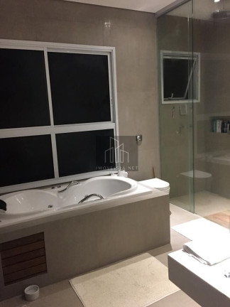 Imagem Casa de Condomínio com 4 Quartos à Venda, 463 m² em Alphaville - Santana De Parnaíba