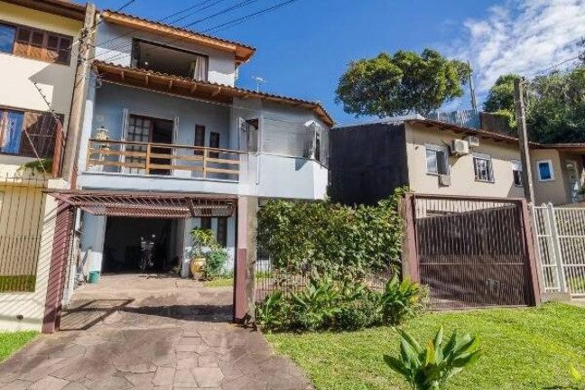 Imagem Casa com 3 Quartos à Venda, 396 m² em Partenon - Porto Alegre Imagem Casa com 3 Quartos à Venda, 396 m² em Partenon - Porto Alegre