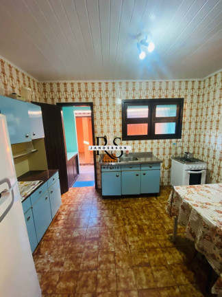 Imagem Casa com 4 Quartos à Venda, 120 m² em Centro - Torres Imagem Casa com 4 Quartos à Venda, 120 m² em Centro - Torres