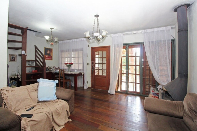 Imagem Casa com 4 Quartos à Venda, 300 m² em Glória - Porto Alegre Imagem Casa com 4 Quartos à Venda, 300 m² em Glória - Porto Alegre