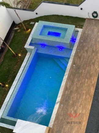 Imagem Casa de Condomínio com 4 Quartos à Venda, 411 m² em Alphaville Nova Esplanada - Votorantim