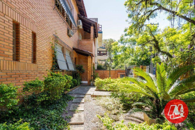 Imagem Casa com 5 Quartos à Venda, 337 m² em Rio Branco - Porto Alegre Imagem Casa com 5 Quartos à Venda, 337 m² em Rio Branco - Porto Alegre