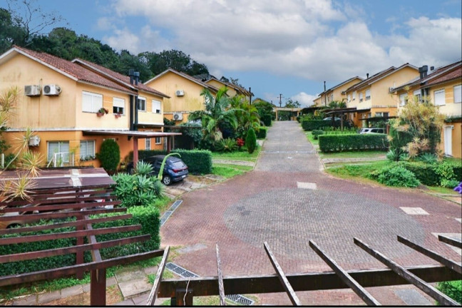 Imagem Casa com 3 Quartos à Venda, 230 m² em Mário Quintana - Porto Alegre Imagem Casa com 3 Quartos à Venda, 230 m² em Mário Quintana - Porto Alegre