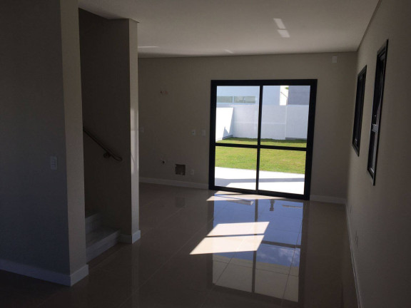 Imagem Casa de Condomínio com 3 Quartos à Venda, 130 m² em Cachoeira Do Bom Jesus - Florianópolis