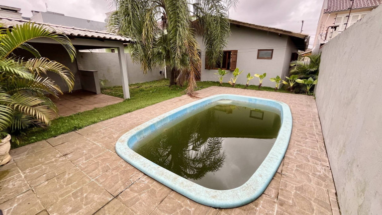Imagem Casa com 3 Quartos à Venda, 143 m² em Igara - Canoas Imagem Casa com 3 Quartos à Venda, 143 m² em Igara - Canoas