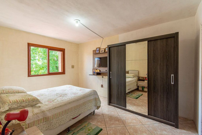 Imagem Casa com 4 Quartos à Venda, 165 m² em Igara - Canoas Imagem Casa com 4 Quartos à Venda, 165 m² em Igara - Canoas
