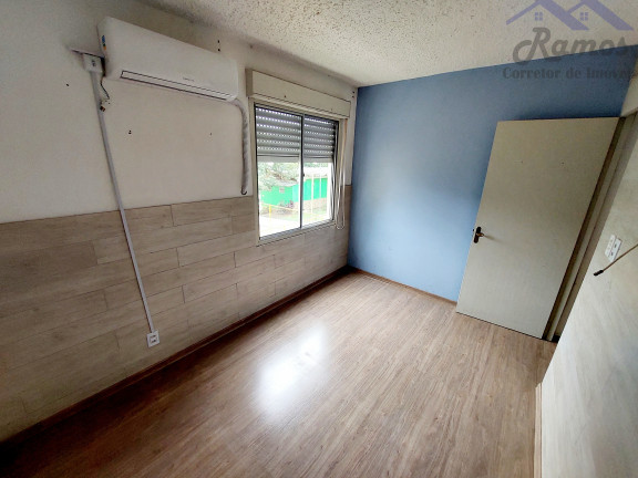 Imagem Imóvel com 2 Quartos à Venda, 50 m² em Vila Nova - Porto Alegre Imagem Imóvel com 2 Quartos à Venda, 50 m² em Vila Nova - Porto Alegre