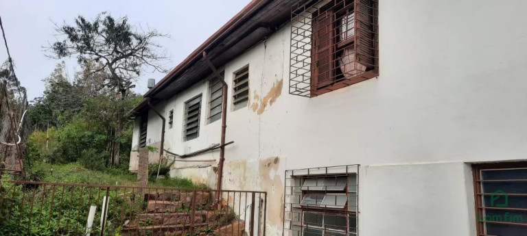 Imagem Casa com 3 Quartos à Venda, 300 m² em Vila Nova - Porto Alegre Imagem Casa com 3 Quartos à Venda, 300 m² em Vila Nova - Porto Alegre